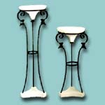 Wrought iron lamp stand comes in two sizes.